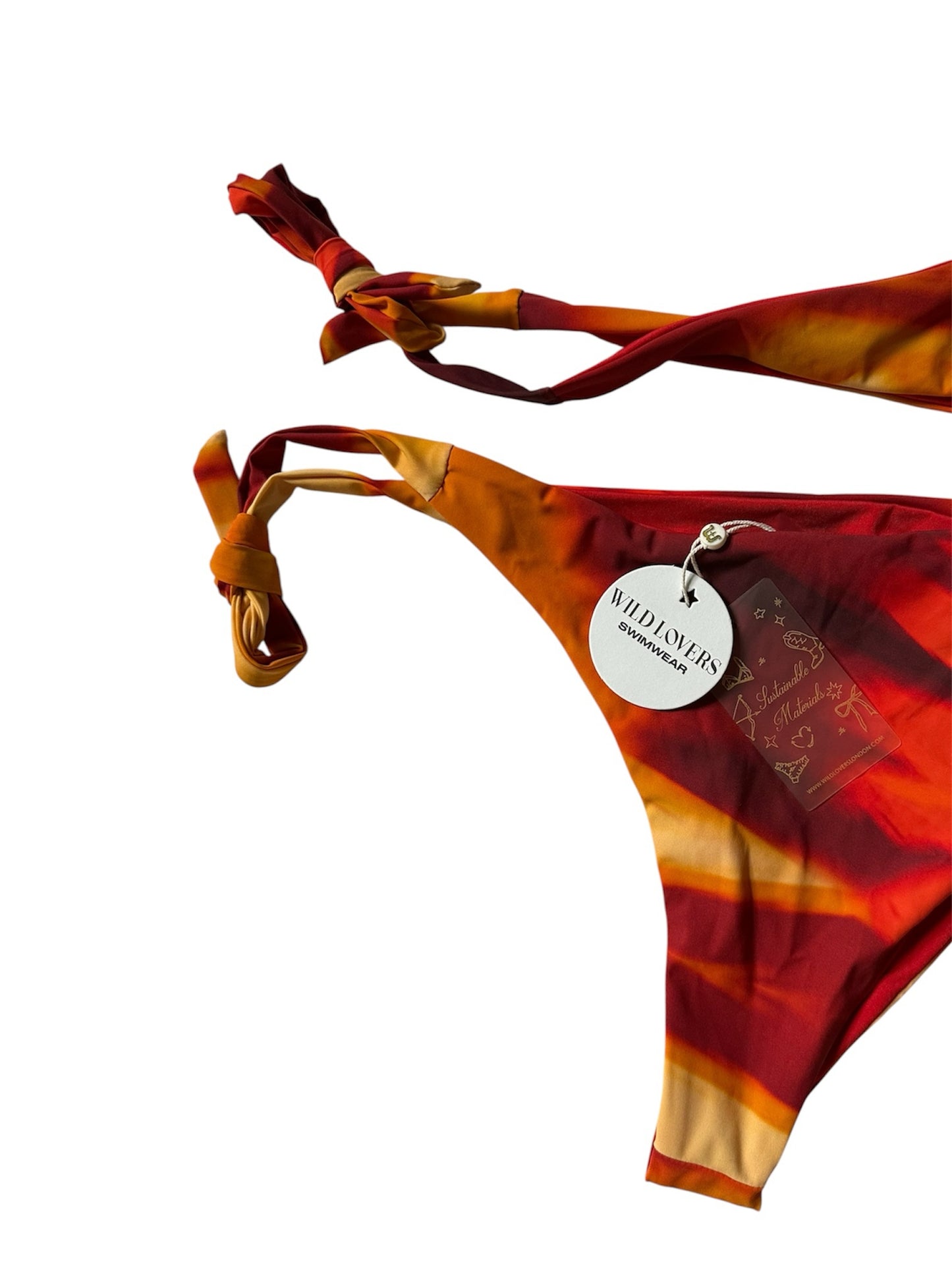 Circular Thrift WILD LOVERS SWIMWEAR red and orange sunset tie-dye bikini bottom with adjustable side tie closures.