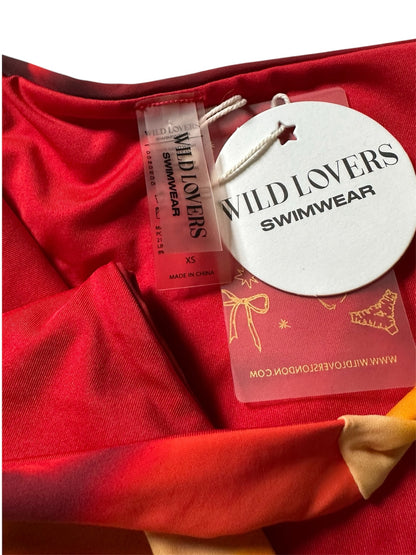 Circular Thrift WILD LOVERS SWIMWEAR red and orange tie-dye swimsuit with brand tags attached